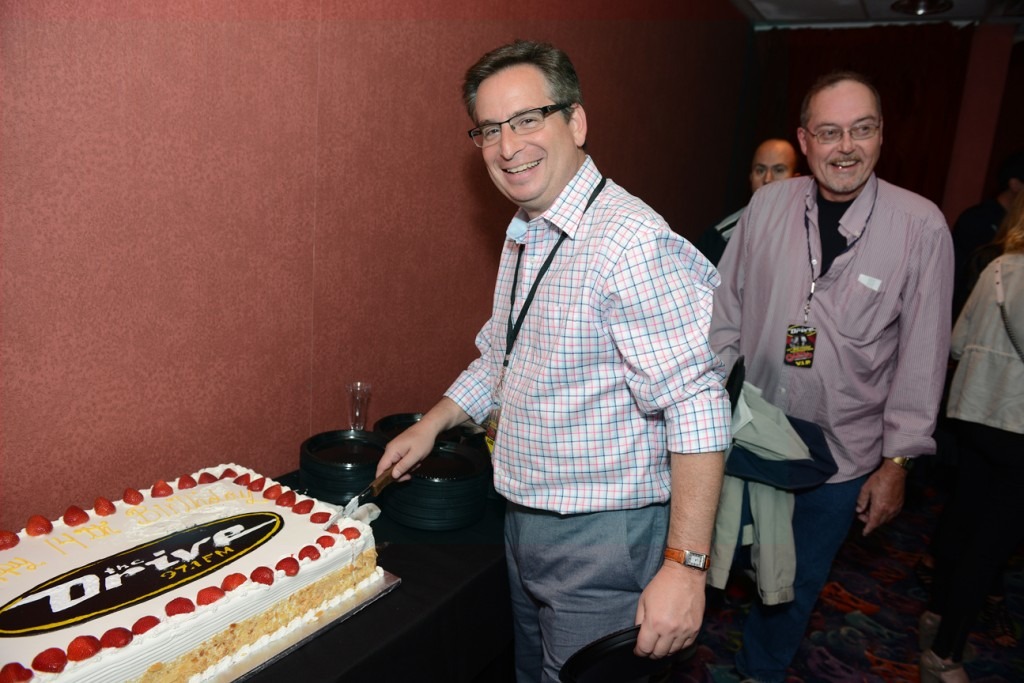 Greg Solk  cuts the cake