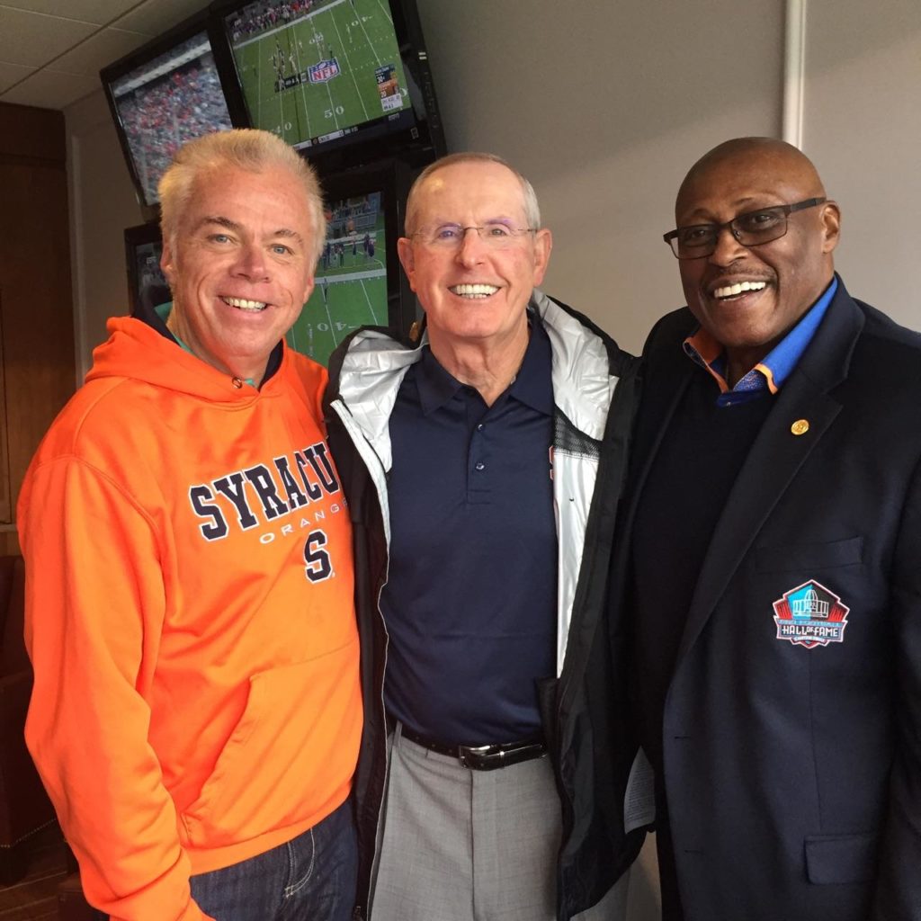 Three SU legends, L-R: Ed Levine, New York Giants' Tom Coughlin, SU Football star Floyd Little 