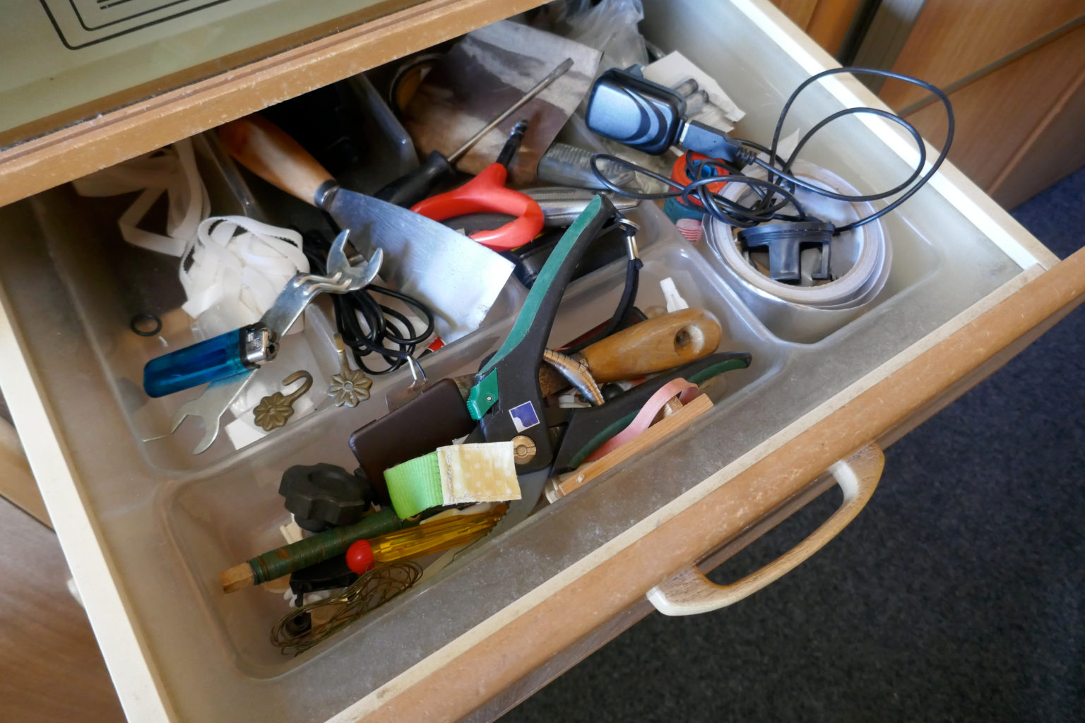 Looking,Into,A,Untidy,Drawer.,Messy,Drawer,With,Tools,,Household